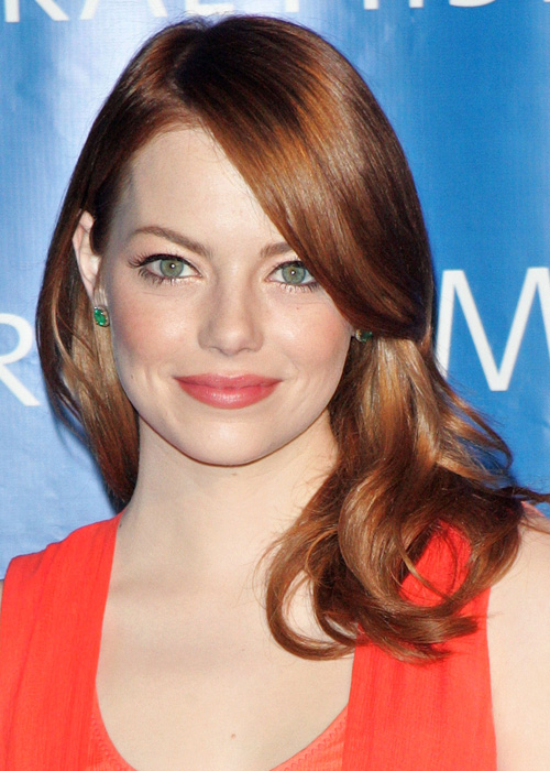Red, like Emma Stone's, is the hardest dyed hue to maintain.Photo: Getty Images