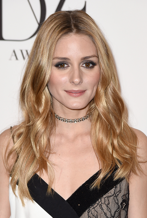 Olivia Palermo waves Olivia Palermo waves